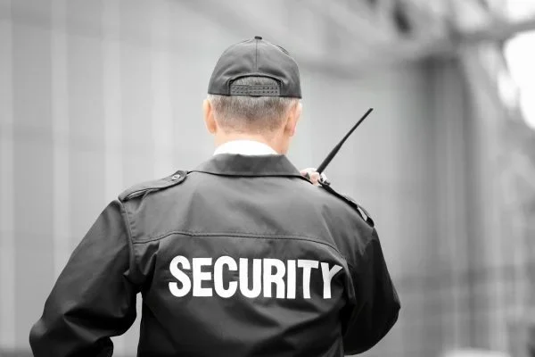 security-guard-1-qrny18ygo5d4huj92t9b0o8rawrnm39oqh63oaxork.webp
